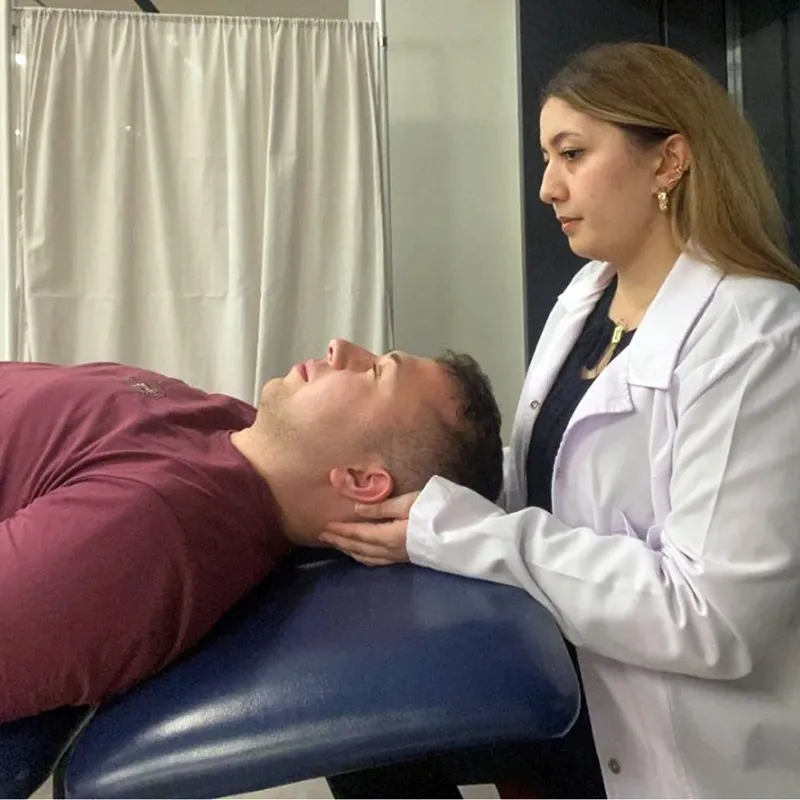 WIN_25_SomaticEdge3 A practitioner applying a sham no-pressure technique.